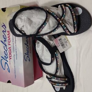 New in box Sketchers sandals.Size 8 Navy with jewel trim.Great sandals and look.